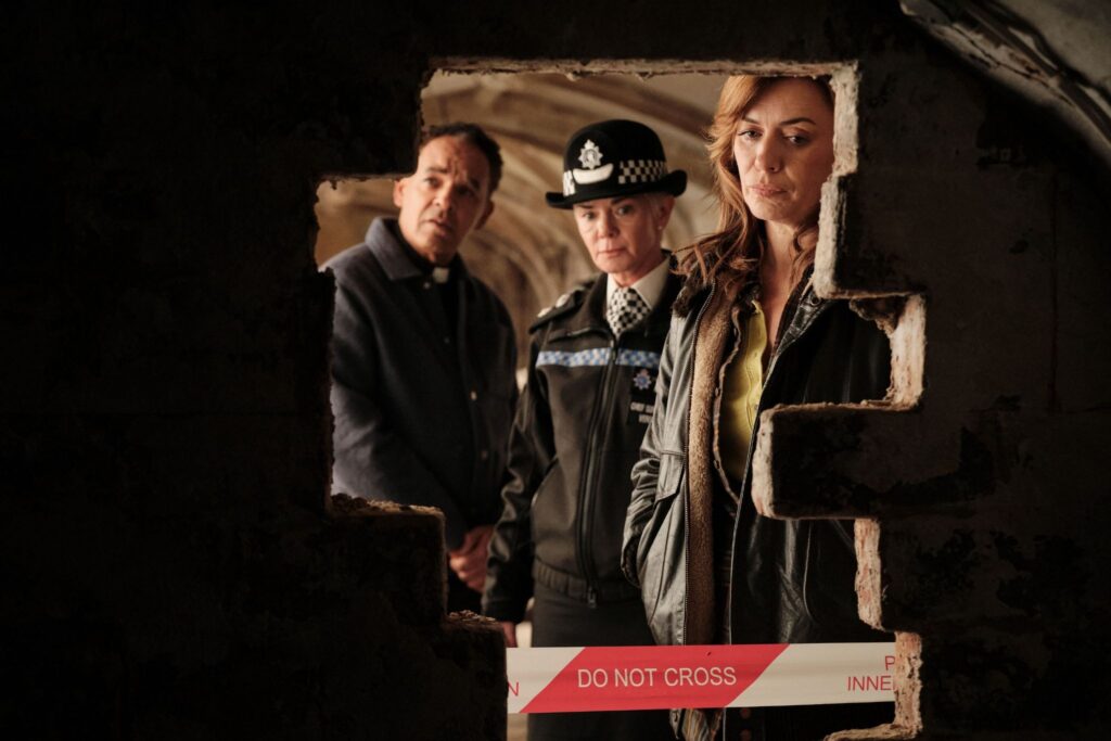 DCI Jeanette Kilburn (Eve Myles) and Superintendent Verity Pound making a chilling discovering in a church in The Crow Girl