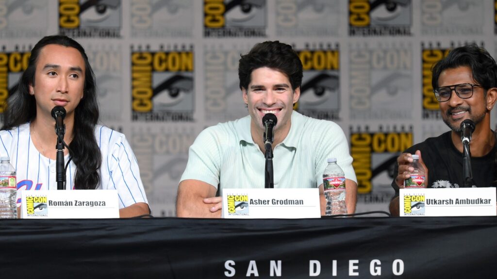 (L-R) Román Zaragoza, Asher Grodman and Utkarsh Ambudkar speak at The Dead & the Undead: CBS Studios: A "Ghosts" Exclusive Panel and "Eternally Yours" premiere screening during 2026 Comic-Con International: San Diego at San Diego Convention Center on July 24, 2026 in San Diego, California.