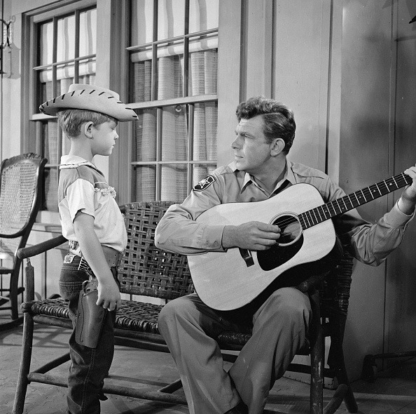 Opie (Ron Howard) and Sheriff Andy Taylor (Andy Griffith) in The Andy Griffith Show